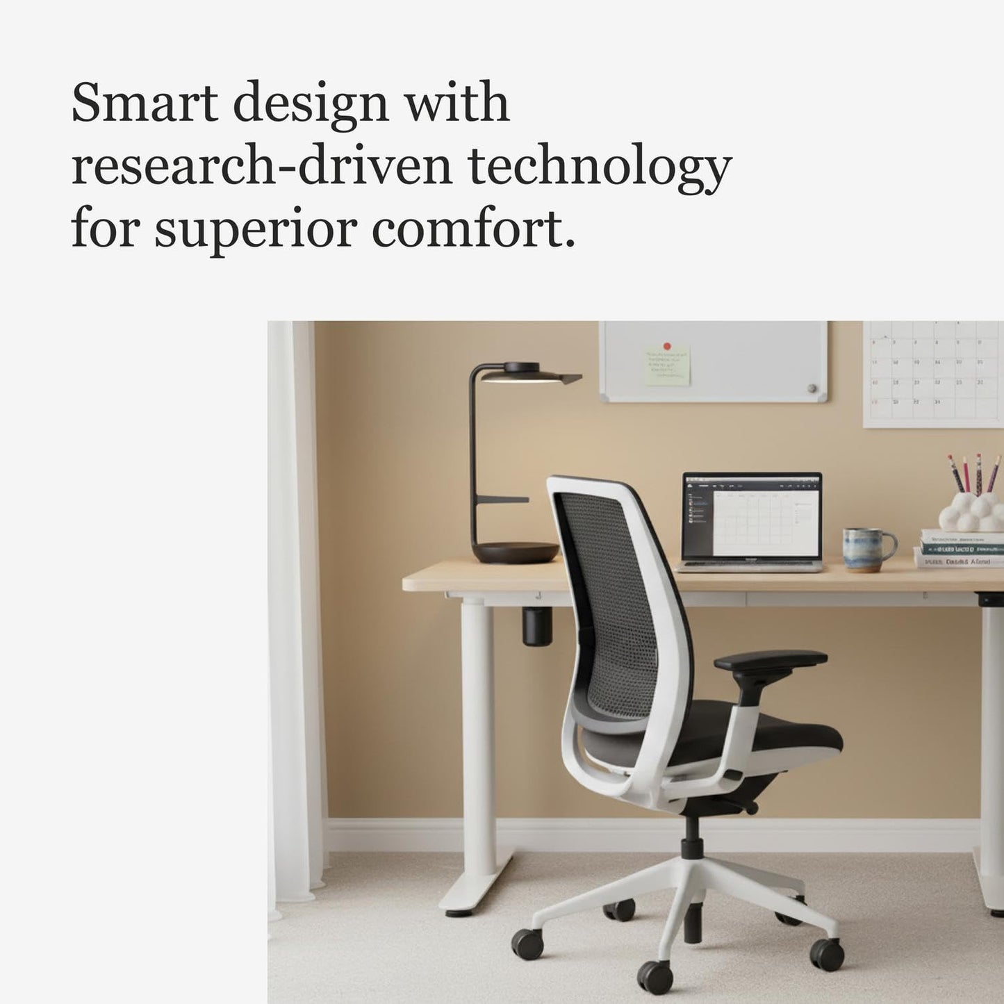 Steelcase Series 2 Office Chair - Ergonomic Work Chair with Wheels for Carpet - with Back Support, Weight-Activated Adjustment & Arm Support - Adjustable Rolling Chairs for Desk - Graphite