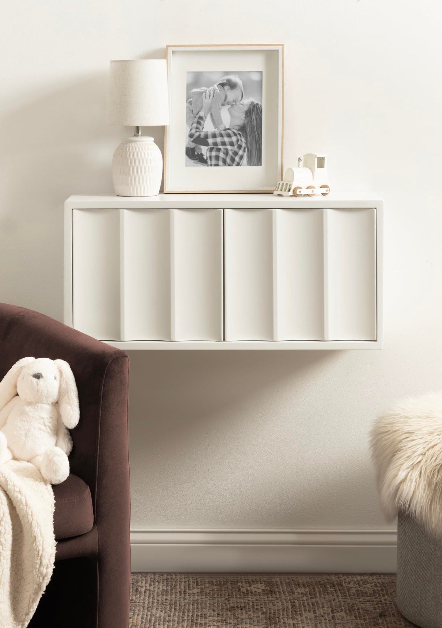 Kate and Laurel Sartell Modern Wooden Two-Door Wall Cabinet, 30 x 10 x 14, White, Decorative Modern Storage Cabinet with Dimensional Face for Use as Floating Nightstand or Cute Nursery Shelf Storage