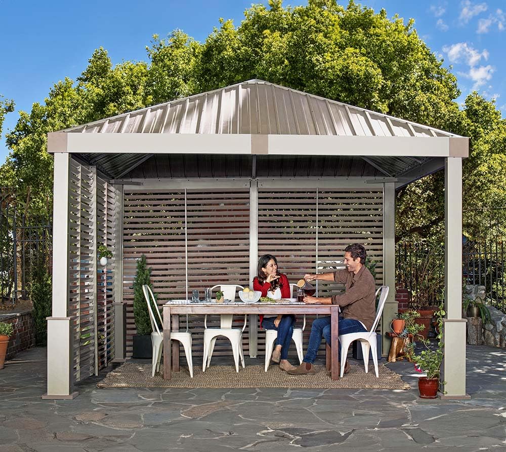 Sojag 12' x 12' Nanda Hardtop Gazebo Outdoor Weather-Resistant Aluminum Frame Shelter with Mosquito Net Champagne
