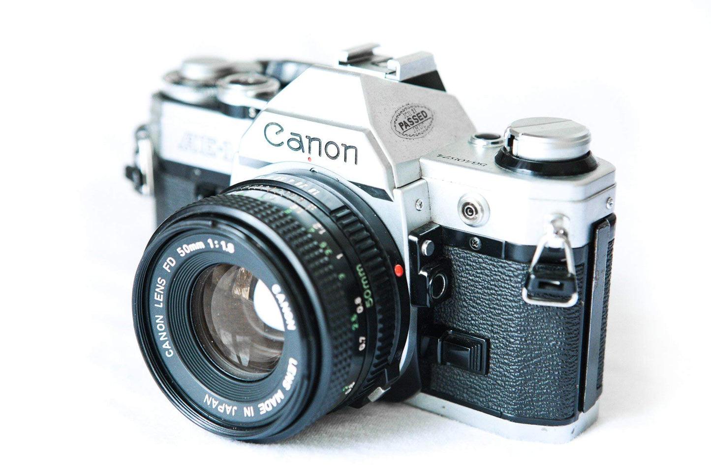 Vintage Canon AE-1 35mm SLR Camera with 50mm 1:1.8 Lens (Renewed)