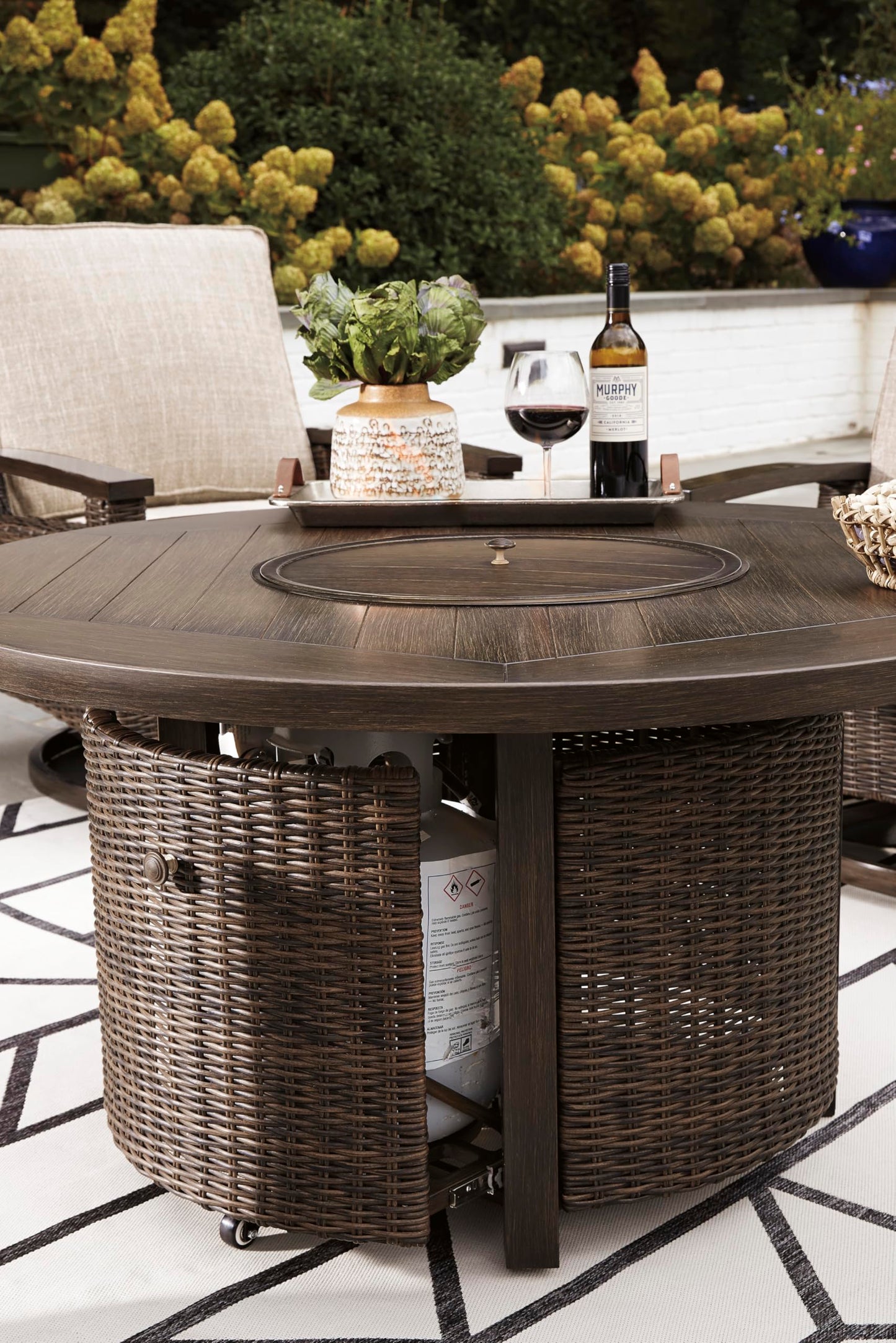 Signature Design by Ashley Paradise Trail Outdoor Round Wicker Patio Fire Pit Table, Brown