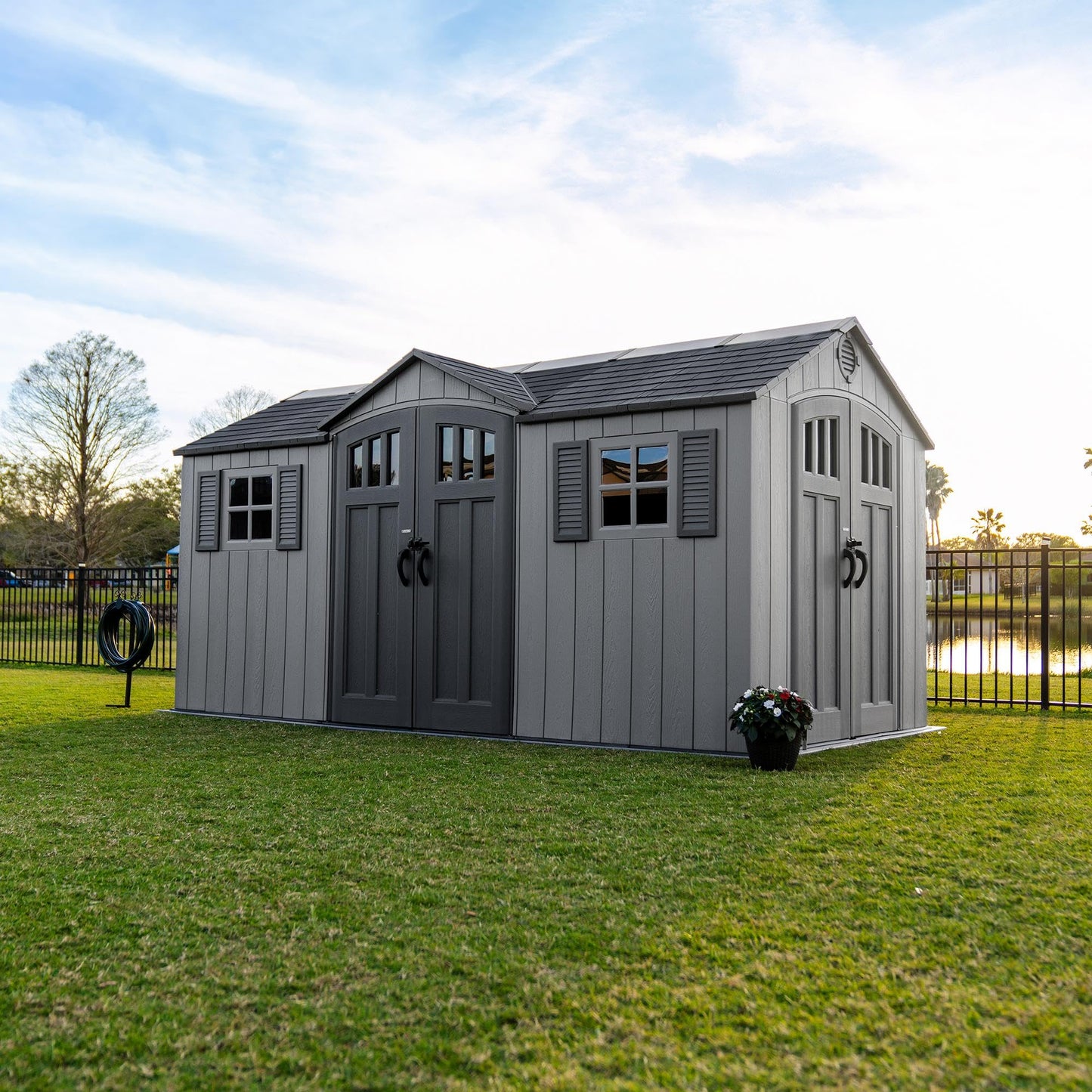 Lifetime Dual Entry Outdoor Storage Shed, 15 x 8 Ft, Steel‑Reinforced, UV‑Protected, Weather‑Resistant Backyard Garden Shed with Skylights, Windows & Shelving, Storm Dust