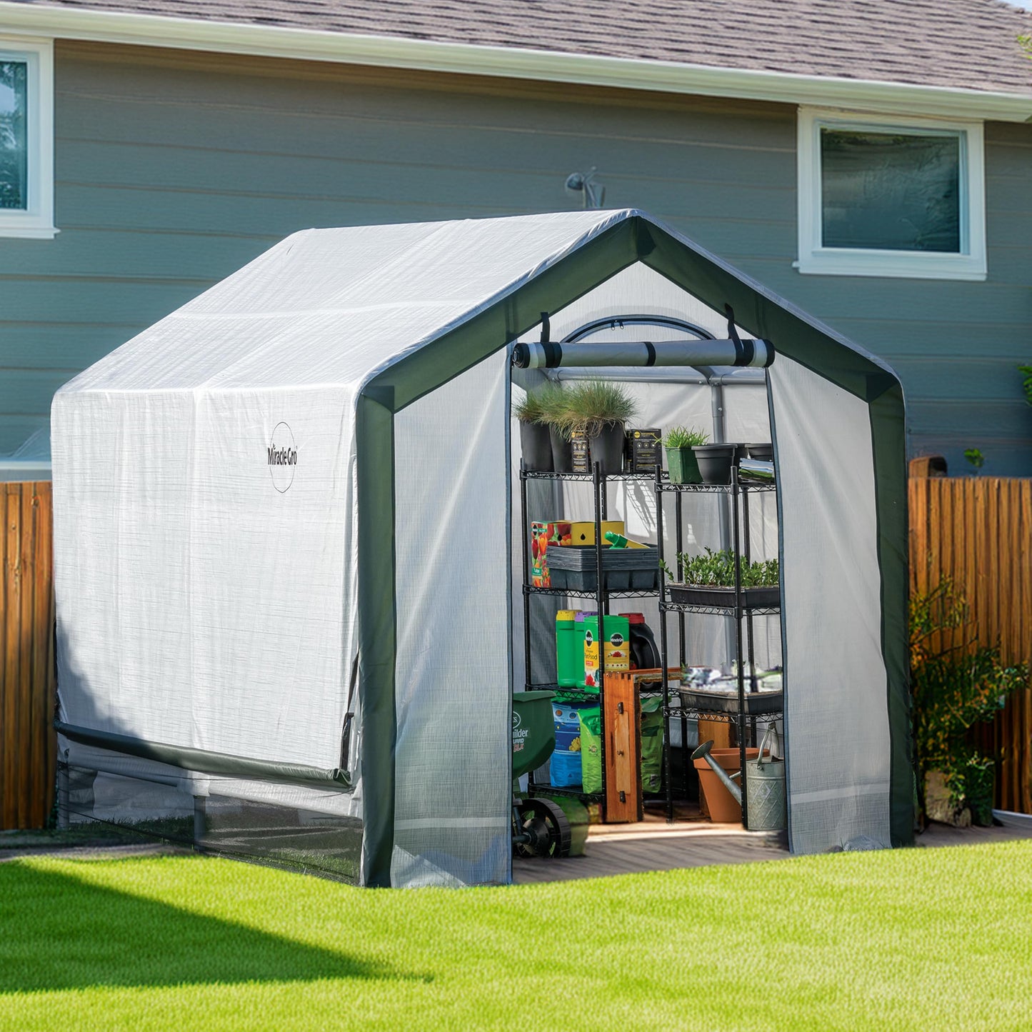 Miracle-GRO 6' x 8' x 6' Outdoor Mini Walk-in Greenhouse Plant Tent, All-Season Small Walk-in Plant Growth Accelerator with UV-Treated Fabric Cover and Zippered Panels, Clear