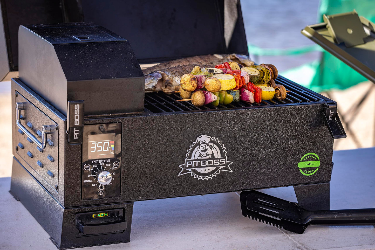 Pit Boss 150 Battery Powered Wood Pellet Grill & Smoker with Flame Broiler 256-Sq. In. Cooking Space, 180°F to 500°F Temperature Range, 7 lb. Pellet Hopper, for Tailgating, Camping, or Travel, Black